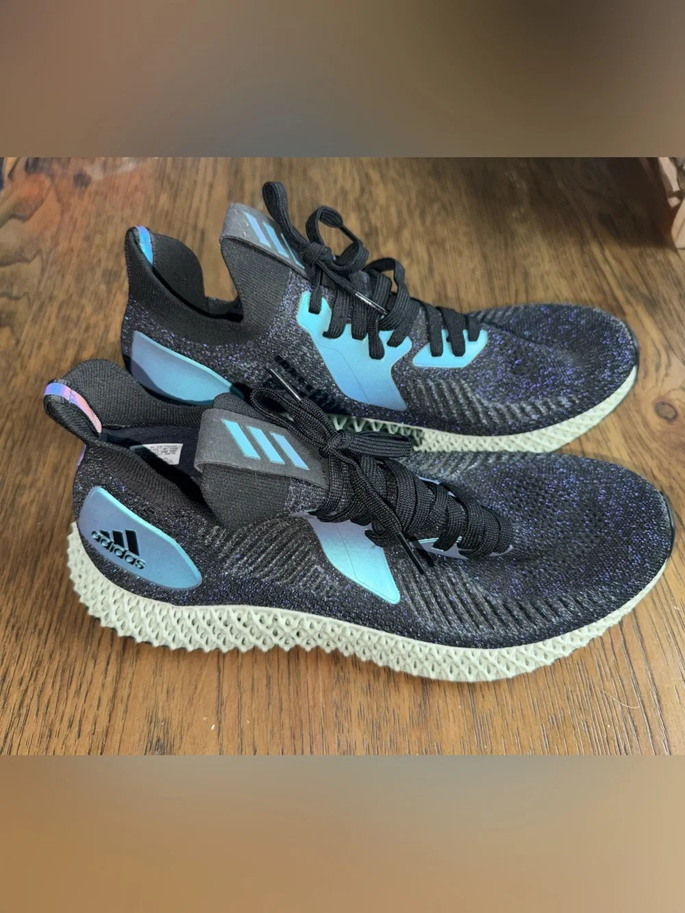 adidas Black Knit Athletic Shoes with Light Blue Accents